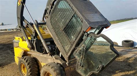 lift cab on new holland skid steer|new holland skid steer cab tilting.